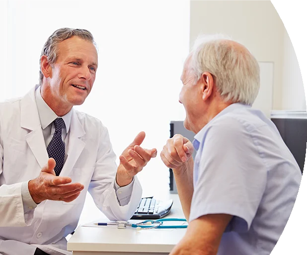 Doctor speaking with a male patient